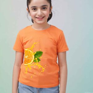 Smiling girl wearing an orange kids t-shirt with citrus fruit print – perfect summer cotton wear