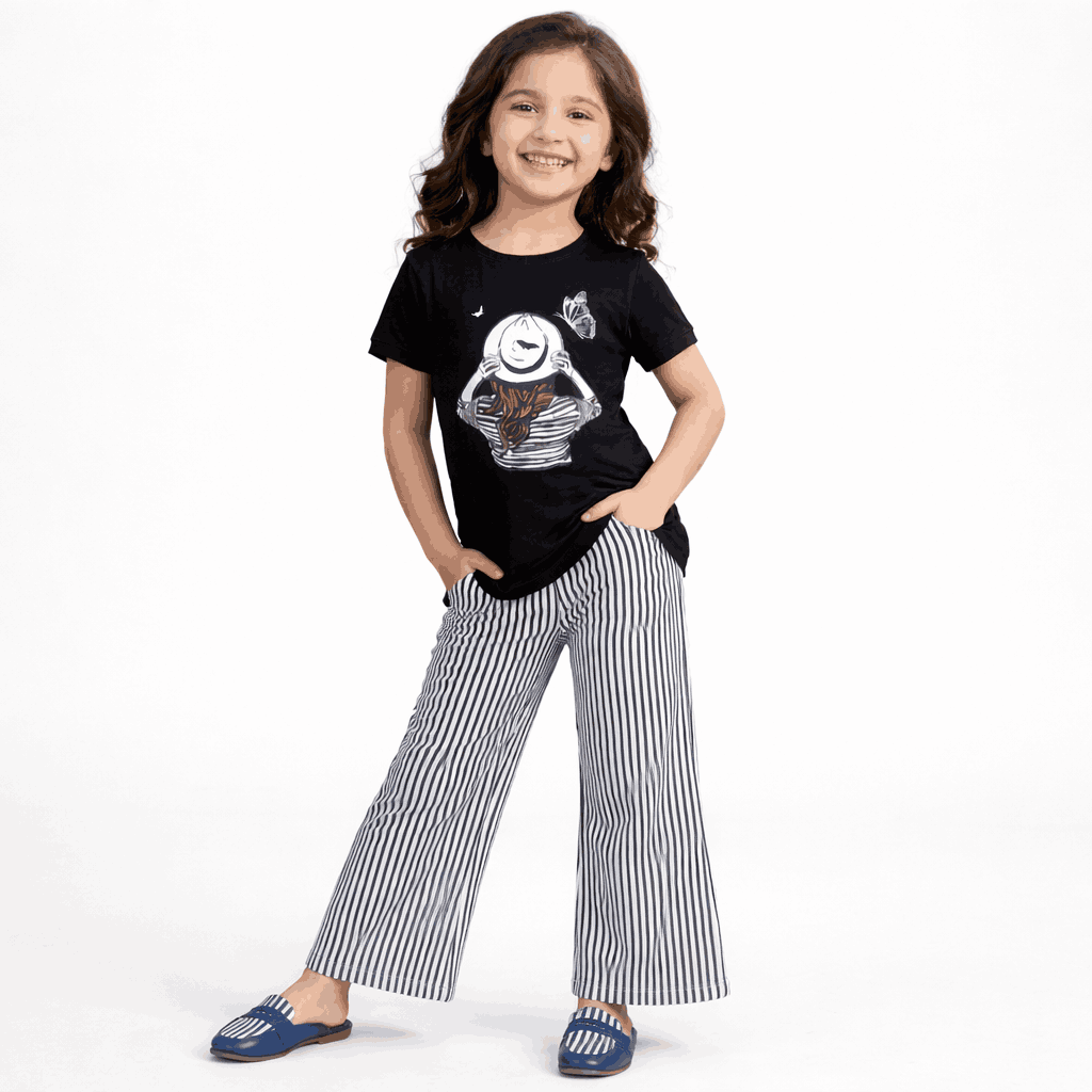 girls black graphic t shirt with striped wide leg pants kids fashion outfit